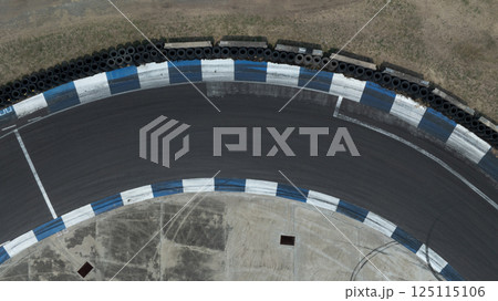 Top view asphalt race track curve, Race track for auto racing top view, Car race track asphalt and curve track circuit, Top view empty curve race track. Top view asphalt race track curve, Race track for auto racing top view, Car race track asphalt and curve track circuit, Top view empty curve race track. 125115106
