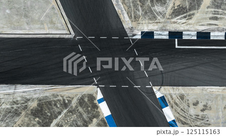 Asphalt race track with tire mark, Race track for auto racing with car tire skid mark, Car race track asphalt track circuit, Empty curve racetrack car tire mark. 125115163