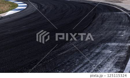 Car tire mark on race track, Abstract black car tire mark on race track, Abstract texture background car tire mark skid mark on asphalt circuit, Tire track on road race speed track circuit. 125115324