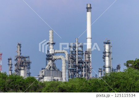 Oil and gas refinery industrial factory plant with blue sky background at oil and gas refinery zone, Business oil and gas industrial plant, Oil and gas refinery petrochemical plant industrial. 125115534