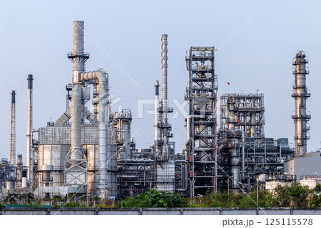 Oil and gas refinery plant at oil and gas refinery industrial zone, Business industrial factory oil and gas refinery plant, Oil refinery petrochemical plant factory storage tank and pipeline steel. Oil and gas refinery plant at oil and gas refinery industrial zone, Business industrial factory oil and gas refinery plant, Oil refinery petrochemical plant factory storage tank and pipeline steel. 125115578