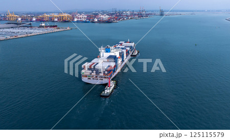 Aerial view container cargo ship at industrial port, Global business shipping logistic cargo ship by container cargo ship, International freight transport container vessel, Sea freight shipping. Aerial view container cargo ship at industrial port, Global business shipping logistic cargo ship by container cargo ship, International freight transport container vessel, Sea freight shipping. 125115579