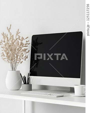 Computer stands on table with plants. Light background. Side view. Computer mockup for design 125117256