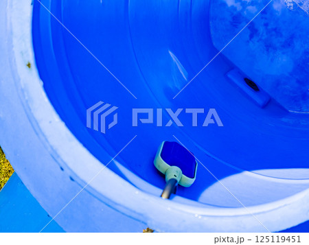 Water or liquid level sensor with float switch in large blue plastic container Water or liquid level sensor with float switch in large blue plastic container 125119451