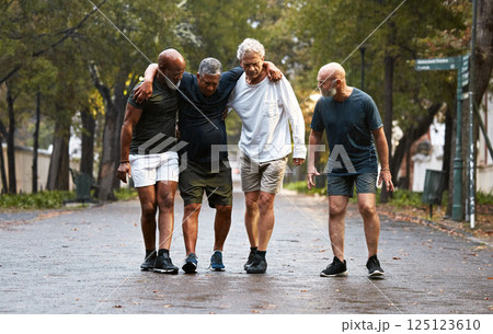 Mature, friends and fitness pain with men helping friend after injury while training in nature for wellness and health. Exercise, workout and man with leg injury being helped by group working out Mature, friends and fitness pain with men helping friend after injury while training in nature for wellness and health. Exercise, workout and man with leg injury being helped by group working out 125123610