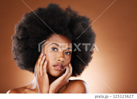 Black woman, afro hair or skincare face glow on studio background for dermatology wellness, cosmetology routine or hair care. Portrait, natural hair or beauty model with makeup cosmetics in self love Black woman, afro hair or skincare face glow on studio background for dermatology wellness, cosmetology routine or hair care. Portrait, natural hair or beauty model with makeup cosmetics in self love 125123627