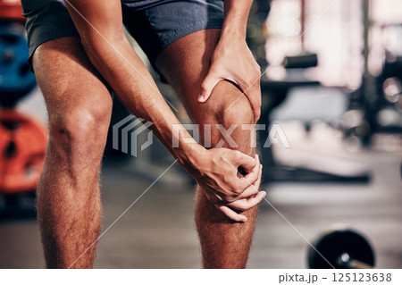 Fitness, exercise and man with knee pain in gym holding leg after injury, accident and muscle pain. Healthcare, sports and male athlete with sore joint, hurt after exercising, workout and training Fitness, exercise and man with knee pain in gym holding leg after injury, accident and muscle pain. Healthcare, sports and male athlete with sore joint, hurt after exercising, workout and training 125123638