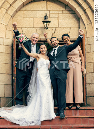 Wedding, bride and groom with parents on stairs, church and happiness at excited celebration. Marriage, couple and celebrate with flowers, portrait and happy family for love with mom, dad and outdoor Wedding, bride and groom with parents on stairs, church and happiness at excited celebration. Marriage, couple and celebrate with flowers, portrait and happy family for love with mom, dad and outdoor 125123649