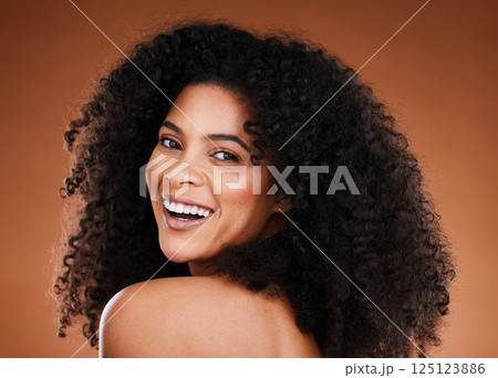 Black woman, beauty and haircare with portrait for curly hair, hair care and hairstyle on a brown studio background. Afro, african american woman and hair style or hair care for health and hair Black woman, beauty and haircare with portrait for curly hair, hair care and hairstyle on a brown studio background. Afro, african american woman and hair style or hair care for health and hair 125123886