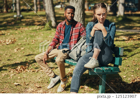 Angry, fight and interracial couple in conflict in a park with stress about divorce, mental health and marriage fail. Depression, sad and black man and woman frustrated with a problem in nature Angry, fight and interracial couple in conflict in a park with stress about divorce, mental health and marriage fail. Depression, sad and black man and woman frustrated with a problem in nature 125123907