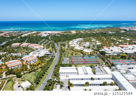 Aerial view on tropical city near caribbean sea shore 125125584