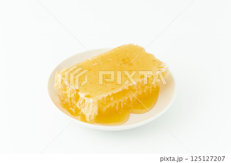 お皿に載せた巣蜜(コムハニー) お皿に載せた巣蜜(コムハニー) 125127207