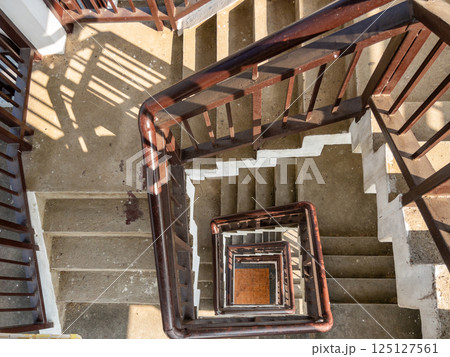 Top-Down View of a Spiral Staircase Inside a Bird-Watching Tower. Top-Down View of a Spiral Staircase Inside a Bird-Watching Tower. 125127561