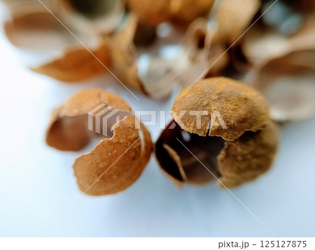A picture of black chickpeas rinds isolated on a white background 125127875