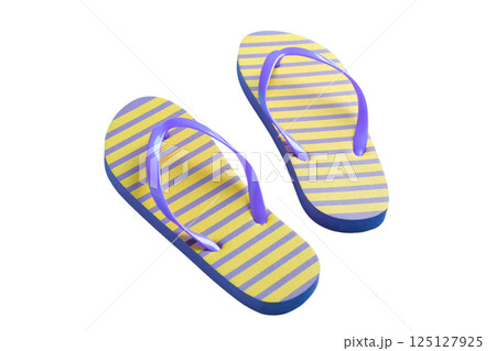 Brightly colored flip flops perfect for summer vacation and travel, isolated on white Brightly colored flip flops perfect for summer vacation and travel, isolated on white 125127925