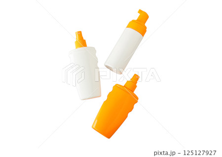Three sunscreen bottles on a white background, isolated on white 125127927