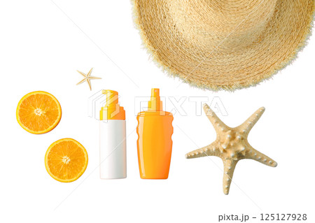 Sunscreen bottles and summer items arranged for a beach getaway, isolated on white 125127928