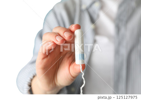 Feminine hygiene and menstruation, Menstrual product held in a hand wearing a striped shirt, isolated on white, PNG Feminine hygiene and menstruation, Menstrual product held in a hand wearing a striped shirt, isolated on white, PNG 125127975