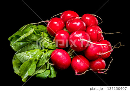 Fresh Red Radishes with Green Leaves on Black Background 125130407