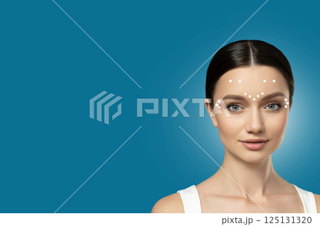 Botox. Skin Care. Facial care concept, girl with charts. Botox. Skin Care. Facial care concept, girl with charts. 125131320