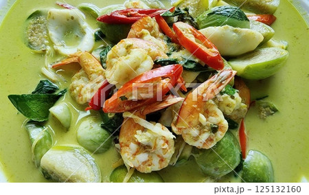 Fresh Seafood Dish with Vibrant Green Curry and Colorful Vegetables. Thai Food. 125132160