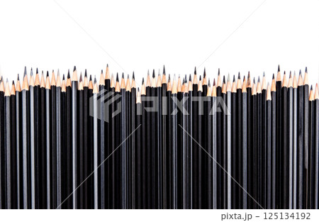 Black pencils standing upright on white background, sharp graphite tips, vertical arrangement, back to school, stationery supplies, minimal style, creative tools Black pencils standing upright on white background, sharp graphite tips, vertical arrangement, back to school, stationery supplies, minimal style, creative tools 125134192