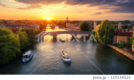 Scenic sunset over river with bridge and boats. Scenic sunset over river with bridge and boats. 125134525