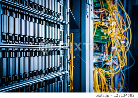 cluster of data storage SSD hard drives inside server rack cluster of data storage SSD hard drives inside server rack 125134592