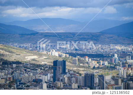 Cityscape of Tbilisi, capital of Georgia, aerial panoramic view from Mtatsminda Park Cityscape of Tbilisi, capital of Georgia, aerial panoramic view from Mtatsminda Park 125136502
