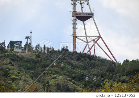 Cable cars to the Tbilisi TV broadcasting communications tower located in Mtatsminda Park above Tbilisi, capital of Georgia 125137052