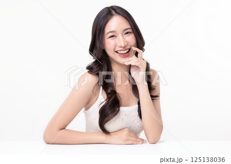 Beauty portrait of happy Asian female face with natural skin make up isolated on white background. 125138036