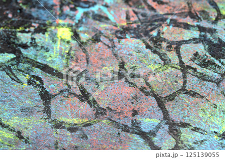 Thick abstract paint surface with heavy texture looking a bit like graffiti hand drawn real dark background 125139055
