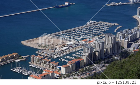 Ocean Village Marina and Residential Buildings Dominating Gibraltar's Coastline Ocean Village Marina and Residential Buildings Dominating Gibraltar's Coastline 125139523