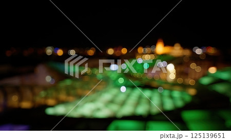 Defocused lights creating bokeh effect at night 125139651