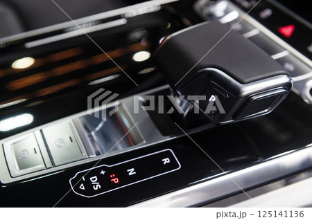 Closeup automatic gearbox transmission vehicle Closeup automatic gearbox transmission vehicle 125141136
