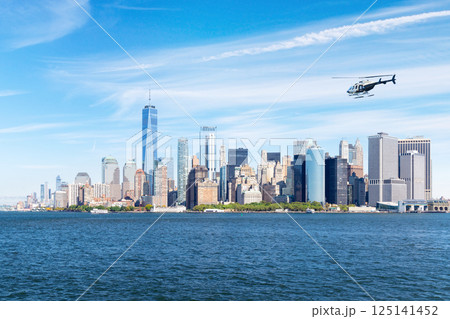 Classic sunny view of Manhattan skyline from the water Classic sunny view of Manhattan skyline from the water 125141452