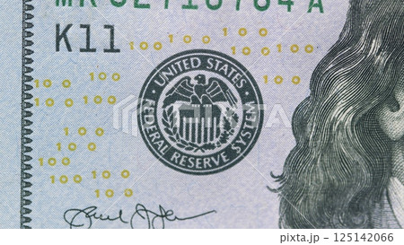This is an image of a US Dollar Bill highlighting its intricate design and features 125142066
