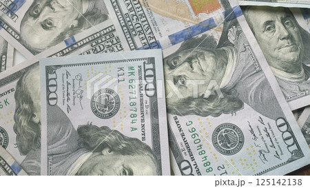 A detailed closeup view of American Dollars in multiple denominations is presented here A detailed closeup view of American Dollars in multiple denominations is presented here 125142138