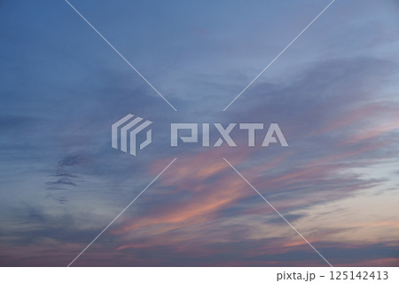 Purple clouds in the sky. Fantasy. The magic of sunset. Romance. Universal photo. 125142413