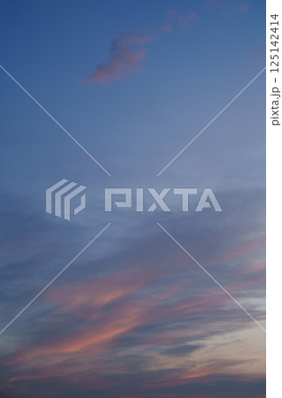 Purple clouds in the sky. Fantasy. The magic of sunset. Romance. 125142414