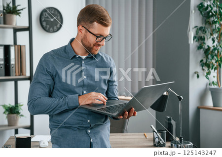 Man is working in the modern office. Conception of business and freelance 125143247