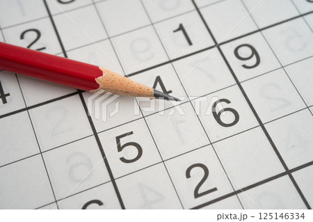 Sudoku puzzle game playing to challenge brain. 125146334