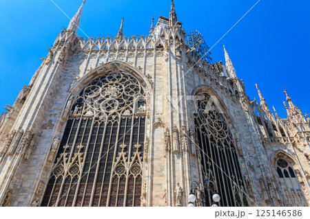 Milan Cathedral, or Metropolitan Cathedral-Basilica of the Nativity of Saint Mary, is the cathedral church of Milan, Lombardy, Italy Milan Cathedral, or Metropolitan Cathedral-Basilica of the Nativity of Saint Mary, is the cathedral church of Milan, Lombardy, Italy 125146586