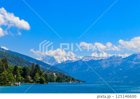 View of the Annecy lake surrounded by beautiful mountains in Annecy, France 125146600