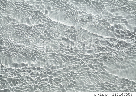 Transparent water with flecks of sunshine 125147503