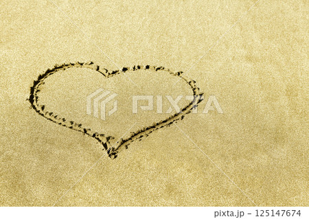 Heart shape on the sandy beach Heart shape on the sandy beach 125147674