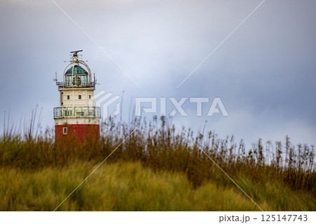 Eierland, De Cocksdorp, Texel, The Netherlands, Oktober 28th, 2024, This charming lighthouse stands 125147743