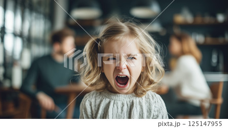 A child cries while parents argue in the background. The crying child highlights the emotional pain and turmoil caused by parental arguments. Generative AI. 125147955