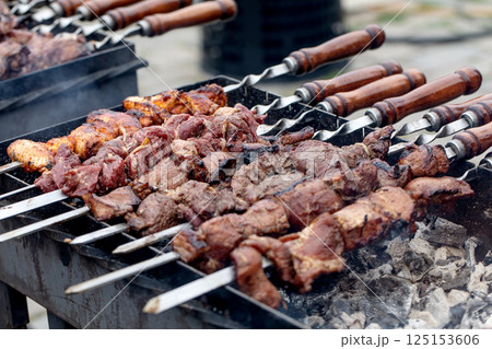 Grilled Meat Skewers On Barbecue Grilled Meat Skewers On Barbecue 125153606