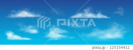 Soft fluffy clouds in clear blue sky background 125154412